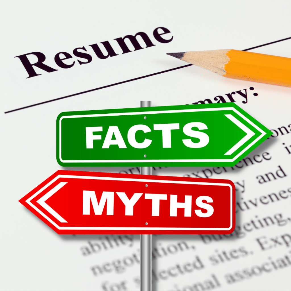 Resumes with facts and and myths signs in the forefront.